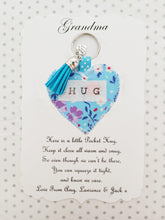 Load image into Gallery viewer, Handmade Pocket Hug heart fabric keyring with tassel - Cornflower Blue Floral Print - bag charm - keychain - missing you gift - stay safe gift - BoutiqueCrafts
