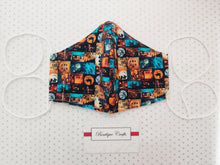 Load image into Gallery viewer, Halloween Face Mask - Removable Nose Wire - Filter Pocket - Adjustable Elastic Ties - Pumpkin Print - Turquoise Polka Dot Lining - BoutiqueCrafts