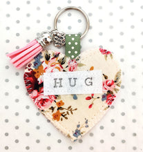 Load image into Gallery viewer, Handmade Pocket Hug heart fabric keyring with tassel - Ivory Floral repeat print - bag charm - keychain - missing you gift - stay safe gift