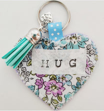 Load image into Gallery viewer, Handmade Pocket Hug heart fabric keyring with tassel - Mint and lilac Floral Print - bag charm - keychain - missing you gift - stay safe gift - BoutiqueCrafts