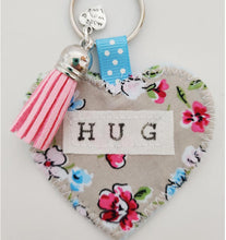 Load image into Gallery viewer, Handmade Pocket Hug heart fabric keyring with tassel - Painterly Floral Print - bag charm - missing you gift - stay safe gift - BoutiqueCrafts