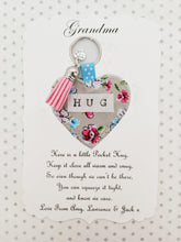 Load image into Gallery viewer, Handmade Pocket Hug heart fabric keyring with tassel - Painterly Floral Print - bag charm - missing you gift - stay safe gift - BoutiqueCrafts