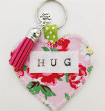 Load image into Gallery viewer, Handmade Pocket Hug heart fabric keyring with tassel - Pink Rose Print - bag charm - keychain - missing you gift - stay safe gift - BoutiqueCrafts