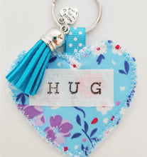 Load image into Gallery viewer, Handmade Pocket Hug heart fabric keyring with tassel - Cornflower Blue Floral Print - bag charm - keychain - missing you gift - stay safe gift - BoutiqueCrafts
