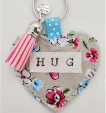Load image into Gallery viewer, Handmade Pocket Hug heart fabric keyring with tassel - Painterly Floral Print - bag charm - missing you gift - stay safe gift - BoutiqueCrafts

