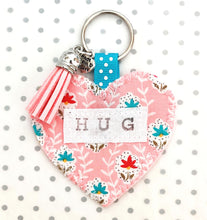 Load image into Gallery viewer, Handmade Pocket Hug heart fabric keyring with tassel - Pink Floral repeat print - bag charm - keychain - missing you gift - stay safe gift
