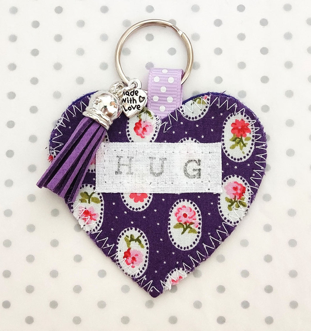 Handmade Pocket Hug heart fabric keyring with tassel - Purple Floral repeat print - bag charm - keychain - missing you gift - stay safe gift